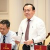 Thứ trưởng Bộ Tài chính Lê Tấn Cận giới thiệu nội dung của Luật. Ảnh: Như Ý . 