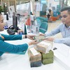 Hiện tiền gửi tại các ngân hàng chủ yếu là ngắn hạn, gây áp lực rất lớn khi ngân hàng cho vay những đại dự án hạ tầng có thời gian thu hồi vốn dài. Ảnh: Dũng Minh 