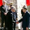 Thủ tướng Canada Mark Carney đón Tổng Bí thư, Chủ tịch nước Tô Lâm. (Ảnh: Thống Nhất/TTXVN)