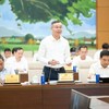 Bộ trưởng Bộ Tài chính Ngô Văn Tuấn trình bày tờ trình - Ảnh: QH.