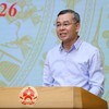 Bộ trưởng Bộ Tài chính Ngô Văn Tuấn báo cáo tại Hội nghị.