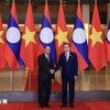 Chủ tịch Quốc hội Trần Thanh Mẫn và đồng chí Vilay Lakhamphong, Ủy viên Bộ Chính trị, Thường trực Ban Bí thư Trung ương Đảng Nhân dân Cách mạng Lào đang thăm chính thức Việt Nam. (Ảnh: Tuấn Anh/TTXVN)