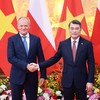 Thủ tướng Lê Minh Hưng và Thủ tướng Donald Tusk chụp ảnh chung. Ảnh: Đức Thanh.
