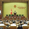 Quốc hội nghe Bộ trưởng Bộ Tài chính giải trình cuối phiên thảo luận. Ảnh: Đức Thanh