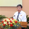 Phó Chủ tịch Thường trực UBND TP. Hà Nội Dương Đức Tuấn trình bày tờ trình.
