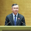 Bộ trưởng Bộ Tài chính Ngô Văn Tuấn báo cáo cuối phiên thảo luận - Ảnh Đức Thanh.
