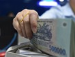 Các ngân hàng đua giảm tiếp lãi suất, có khoản vay được giảm tới 5%/năm so với lãi thông thường