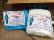 Truy tố 4 bị can trong đường dây buôn bán trang phục phòng dịch giả