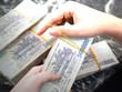 Nguy cơ bị phạt cổ tức, ngân hàng dồn dập xóa nợ tại VAMC