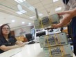 Lợi nhuận ngân hàng gần tới đích cả năm