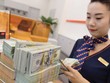 Lãi suất huy động giảm chưa tác động đến tỷ giá