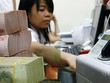 Giáp Tết, ngân hàng vẫn thừa tiền mặt