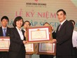 Thứ trưởng Bộ Tài chính Trần Xuân Hà trao tặng Bằng khen của Bộ trưởng Bộ Tài chính cho Phó tổng giám đốc BSC Trần Thị Thu Thanh