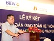 Ông Trần Bắc Hà, Chủ tịch HĐQT BIDV phát biểu tại lễ ký kết biên bản bàn giao toàn hệ thống và công bố sáp nhập MHB vào BIDV - Ảnh: Lê Toàn