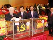 Các đồng chí lãnh đạo Đảng, Nhà nước và đại biểu bỏ phiếu bầu Ban Chấp hành Trung ương Đảng khóa XII. (Ảnh: TTXVN)