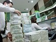 Nâng lãi suất tiền gửi USD sẽ hút nguồn vốn nước ngoài, đồng thời kéo USD đang được cất giữ của người dân vào ngân hàng