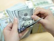 Đồng USD trên thị trường thế giới đã duy trì xu hướng mạnh lên rõ nét trước sự hồi phục của kinh tế Mỹ và chính sách tăng lãi suất của Fed