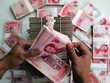 Đầu tuần này, đồng nhân dân tệ chạm mức thấp nhất so với USD trong 1 năm qua, dưới mức 6,8 nhân dân tệ đổi 1 USD