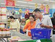 Nhiều nhà bán lẻ trên địa bàn TP.HCM đã đăng ký khuyến mãi giảm giá từ 5 - 49%. Trong ảnh: Siêu thị của Saigon Co.op đã đồng loạt giảm giá sớm 