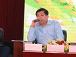 Bộ trưởng Bộ Kế hoạch và Đầu tư Nguyễn Chí Dũng phát biểu tại ại Hội nghị Thủ tướng đối thoại với nông dân. 