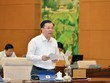 Bộ trưởng Bộ Tài chính Đinh Tiến Dũng trình bày báo cáo (Ảnh: QK)