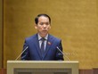 Chủ nhiệm Uỷ ban Pháp luật Hoàng Thanh Tùng trình bày báo cáo tiếp thu, giải trình trước khi đại biểu bấm nút.