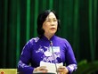 Bộ trưởng Bộ Lao động - Thương binh và Xã hội Phạm Thị Hải Chuyền báo cáo trước Quốc hội