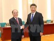 Chủ tịch Quốc hội Nguyễn Sinh Hùng hội kiến với Tổng Bí thư, Chủ tịch Trung Quốc Tập Cận Bình (Ảnh: Vietnam+)