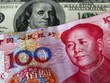 Nhân dân tệ suy yếu trong khi USD đang có xu hướng đi lên. (Ảnh minh họa: Reuters)