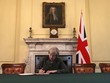 Thủ tướng Theresa May ký bức thư lịch sử kích hoạt quá trình rời Liên minh châu Âu. Ảnh: Reuters.