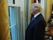 Tổng thống Donald Trump nhìn ra cửa sổ sau cuộc phỏng vấn với phóng viên Reuters tại phòng Bầu dục ngày 27/4. Ảnh: Reuters.