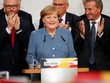 Thủ tướng Đức Angela Merkel phát biểu mừng chiến thắng với nhiệm kỳ thứ 4. Ảnh: Reuters.