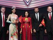 Bà Thuỷ (áo đỏ) tại lễ ra mắt xe VinFast ở triển lãm Paris. Ảnh: VinFast.
