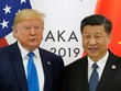 Tổng thống Mỹ Donald Trump (trái) và Chủ tịch Trung Quốc Tập Cận Bình tại cuộc gặp bên lề hội nghị G20 ở Osaka ngày 29/6. Ảnh: Reuters.