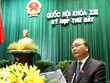 hó Thủ tướng Nguyễn Xuân Phúc trình bày báo cáo kinh tế xã hội nửa đầu năm 2014 trước Quốc hội (Ảnh: Dân trí)
