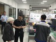 Bộ trưởng Tài chính Mỹ Janet Yellen thăm khu vực sản xuất pin tại nhà máy sản xuất xe máy điện Selex Motor. Trong ảnh CEO Selex Motors Nguyễn Hữu Phước Nguyên giới thiệu với Bộ trưởng Tài chính Mỹ về quy trình sản xuất pin của công ty.
