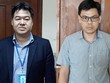 Ông Giang và Quang vừa bị bắt giữ.