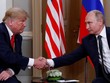 Tổng thống Trump và Tổng thống Putin bắt tay cuộc gặp ở Phần Lan (Ảnh: Reuters).