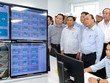 Thủ tướng kiểm tra phòng điều hành quản lý sinh trắc học và xử lý hồ nước thải tại khu công nghiệp Formosa. Ảnh: VGP.