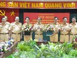 Lãnh đạo Cục Cảnh sát giao thông chúc mừng Thiếu tướng Trần Sơn Hà và Thiếu tướng Vũ Đỗ Anh Dũng. Ảnh Cục CSGT.