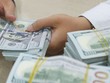 Giá giao dịch USD trên thị trường đang giảm, dù Fed lần thứ tư nâng lãi suất trong năm.