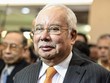 Ông Najib Razak đến tòa vào ngày 11.11. AFP