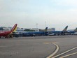 Máy bay của các hãng hàng không Vietnam Airlines và Vietjet. (Ảnh: Việt Hùng/Vietnam+).