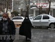 Người dân đeo khẩu trang phòng tránh dịch COVID-19 tại Tehran, Iran, ngày 23/2. (Nguồn: IRNA/TTXVN).