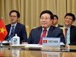 Phó Thủ tướng, Bộ trưởng Ngoại giao Phạm Bình Minh tham dự hội nghị trực tuyến. (Ảnh: TTXVN phát).