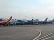 Máy bay của các hãng hàng không Vietnam Airlines và Vietjet. (Ảnh: Việt Hùng/Vietnam+).
