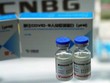 Vaccine Covid-19 tiềm năng do CNBG phát triển trưng bày tại hội chợ thương mại ở Bắc Kinh hôm 4/9. Ảnh: Reuters.