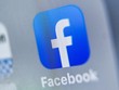 Biểu tượng của Facebook trên màn hình máy tính bảng. (Ảnh: AFP/TTXVN).