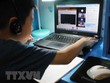 Học sinh học trực tuyến. (Nguồn: TTXVN).
