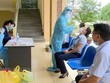 Thị xã Đông Triều tiến hành xét nghiệm tầm soát nhằm phát hiện sớm người mắc COVID-19. (Ảnh: Văn Đức/TTXVN).